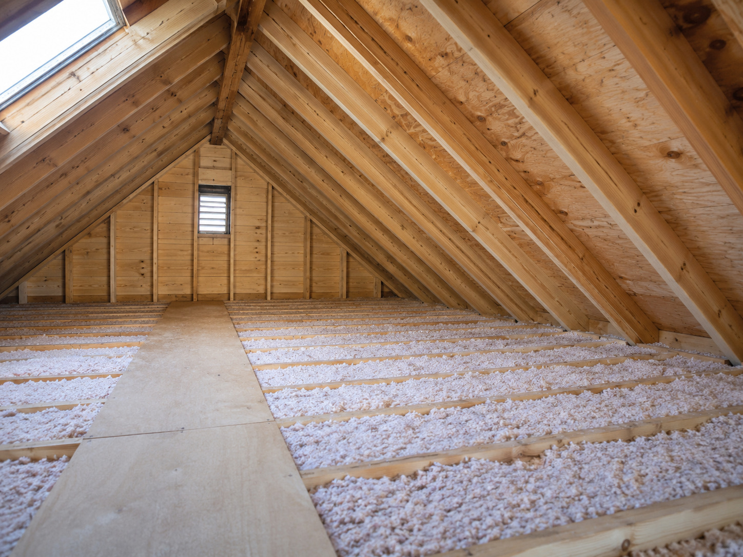 Restored attic space clean and mold-free with new insulation