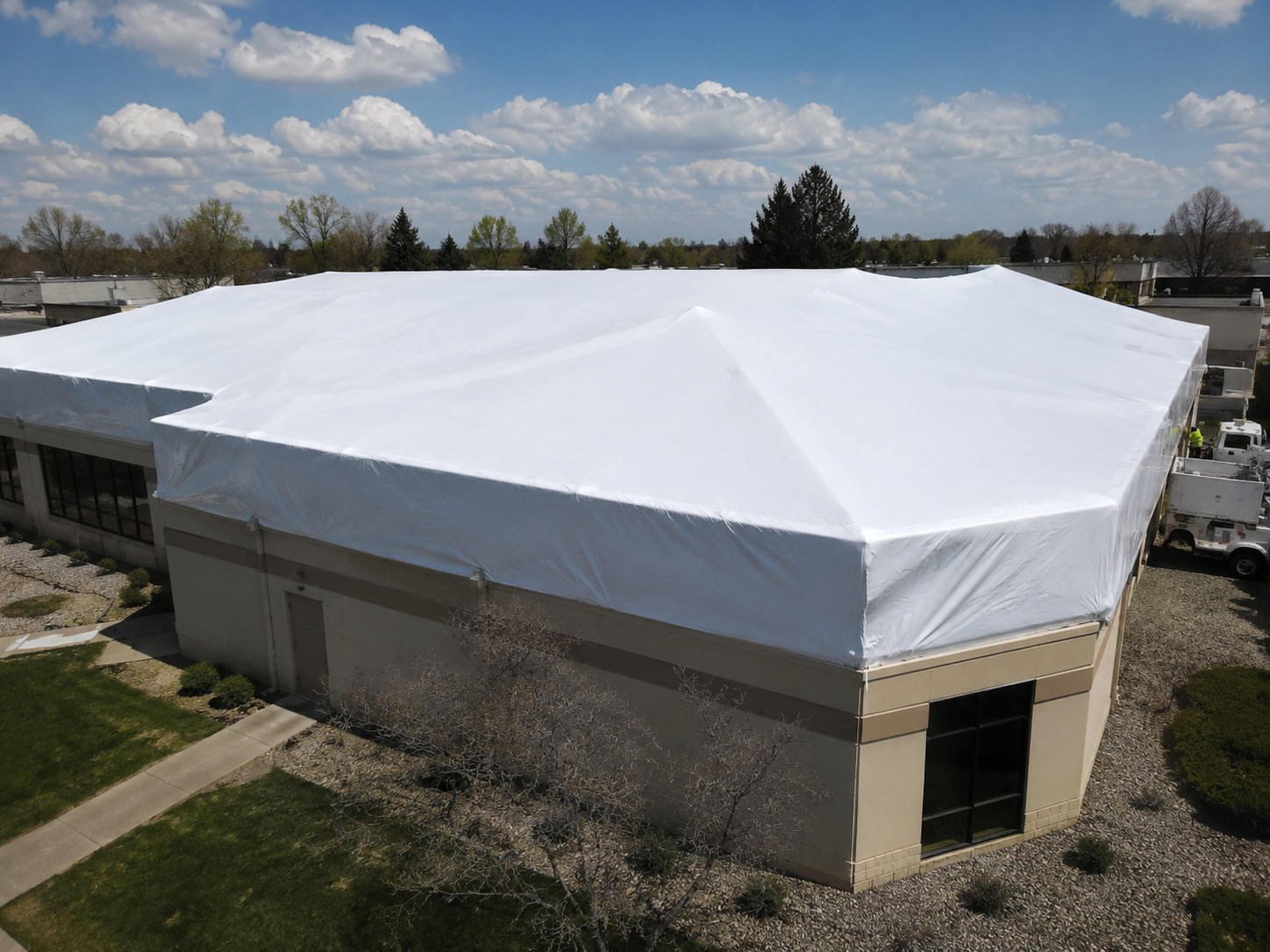 Large commercial building with shrink wrap protection