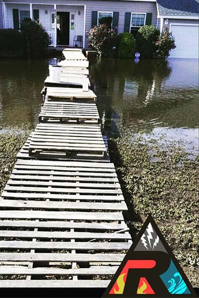 flooded-yard-with-pallets